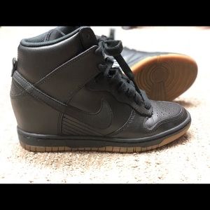 All black Nike wedge sneakers